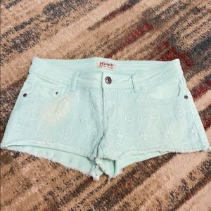 Mint green jean shorts